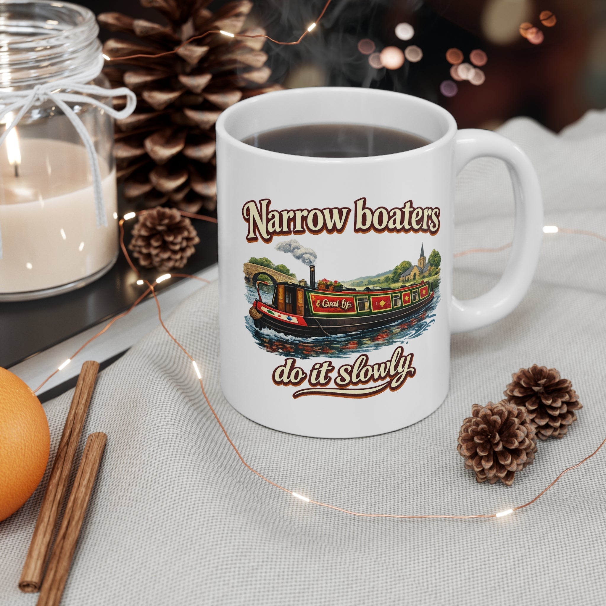 Narrow boat graphic coffee mug with text narrow boaters do it slowly