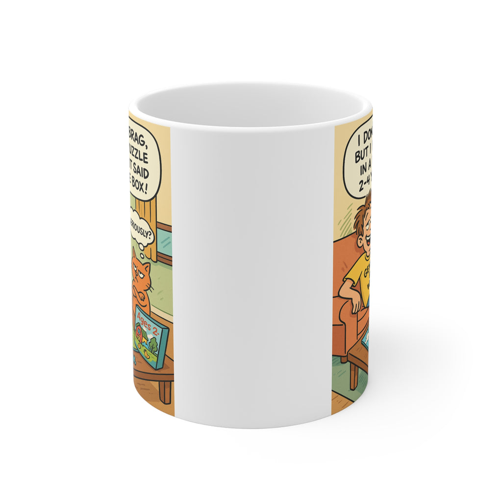 Mug with a cartoon design of a man and cat playing with a  jigsaw puzzle, featuring humorous text.
