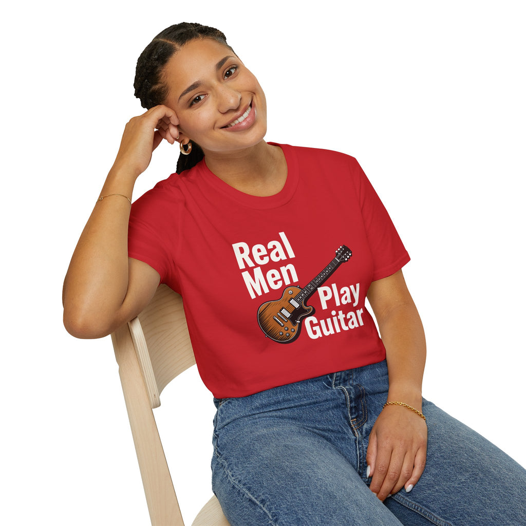 Person wearing a red t-shirt with 'Real Men Play Guitar' text and guitar graphic.