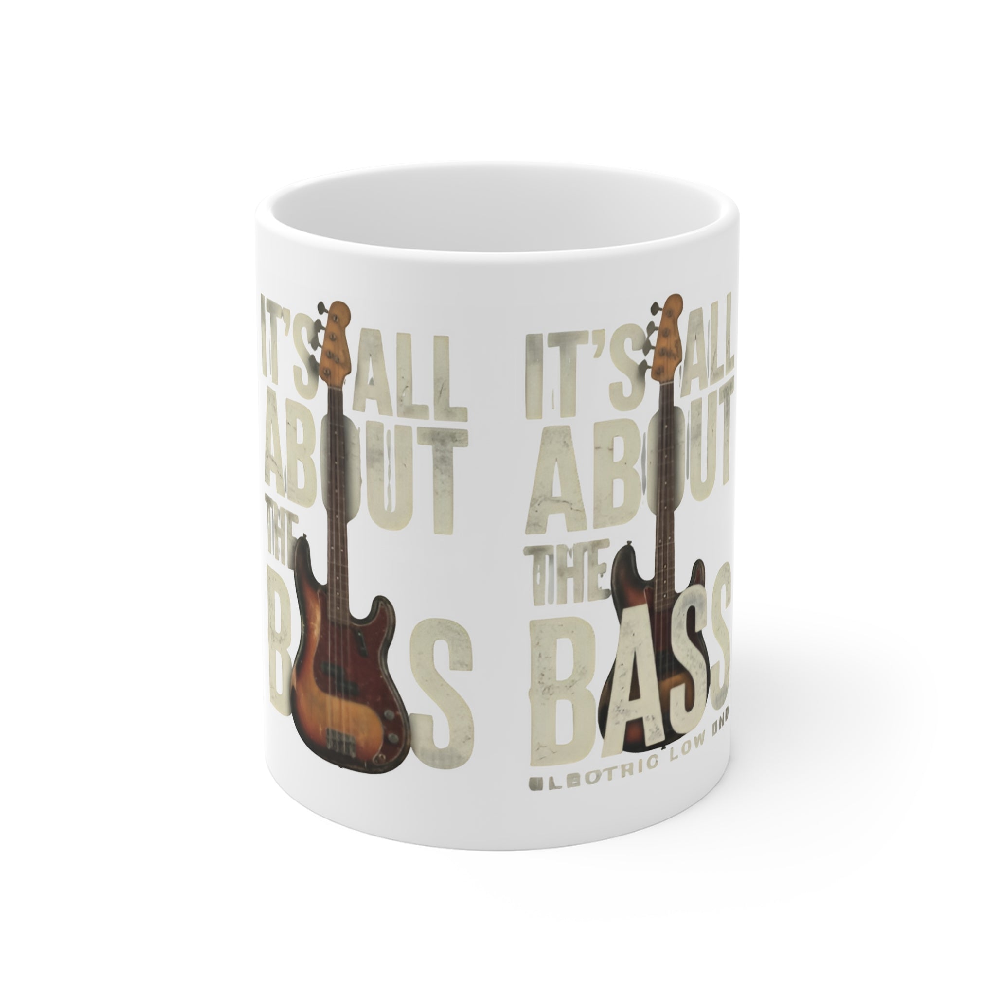 Mug with bass guitar design and text 'It's All About the Bass' on a white background