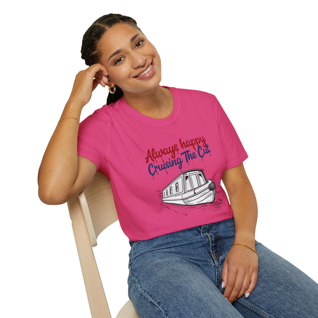 Person wearing a pink t-shirt with a boat graphic and text, sitting on a chair.