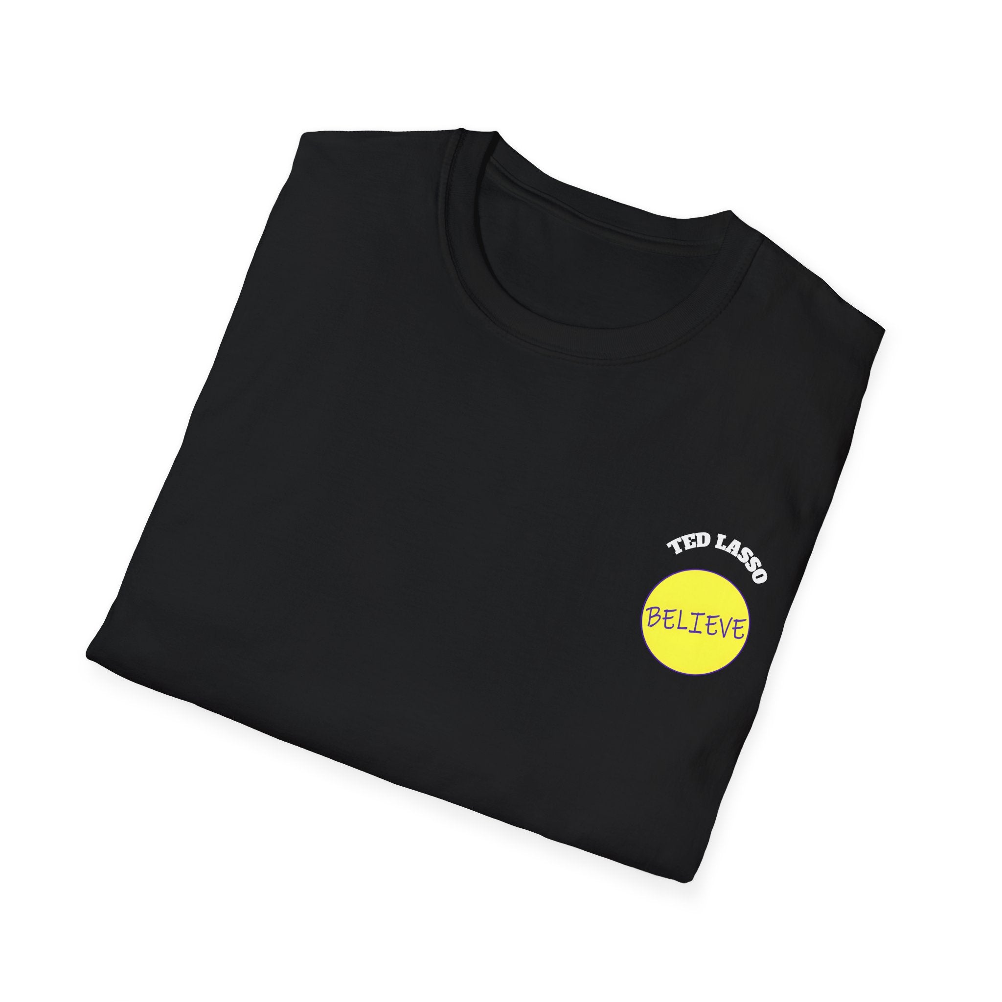 Folded black t-shirt with yellow 'Ted Lasso Believe' logo on a white background