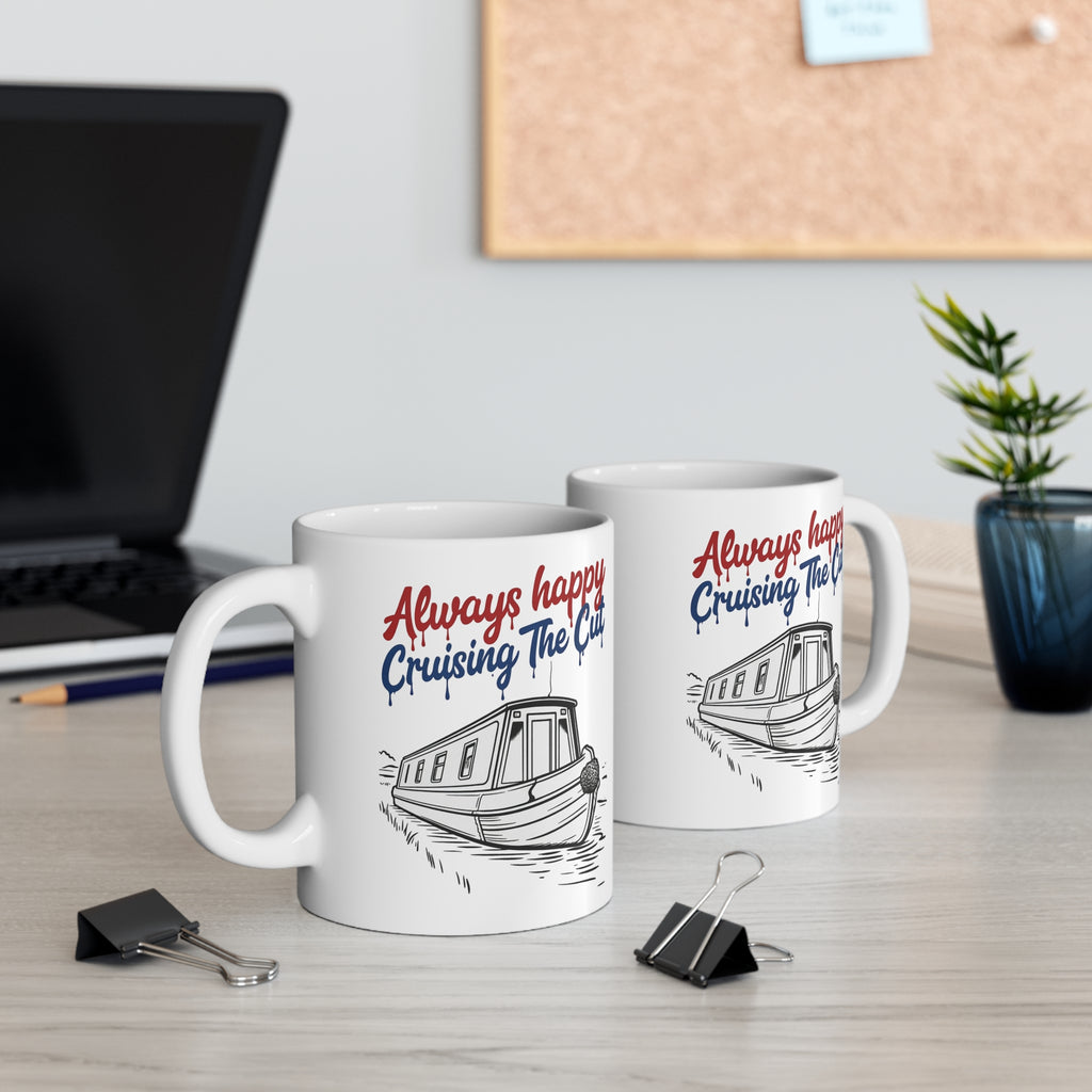 Two mugs with boat design and text on a desk with office items.