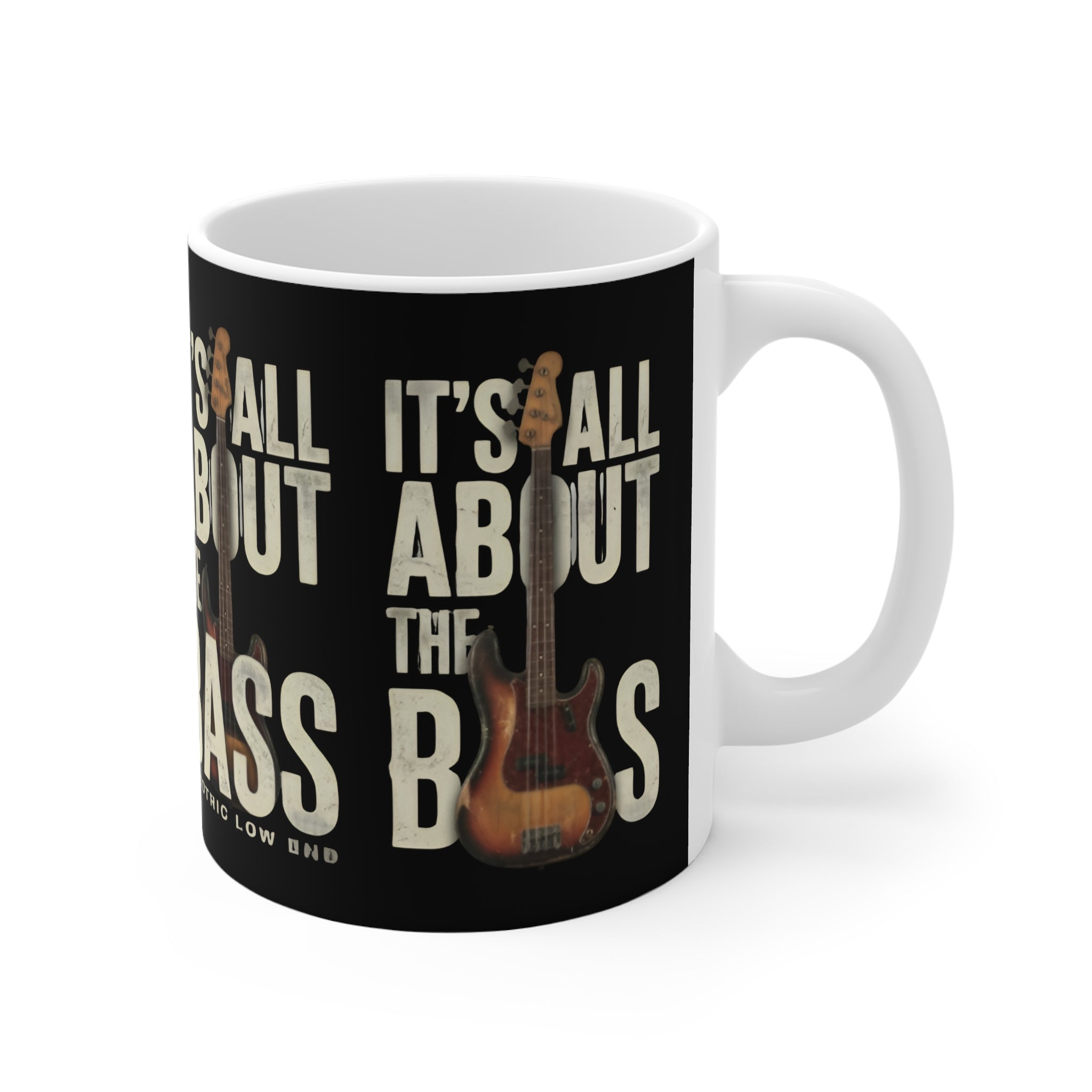 Mug with a graphic of a bass guitar and text 'It's All About the Bass' on a black background.