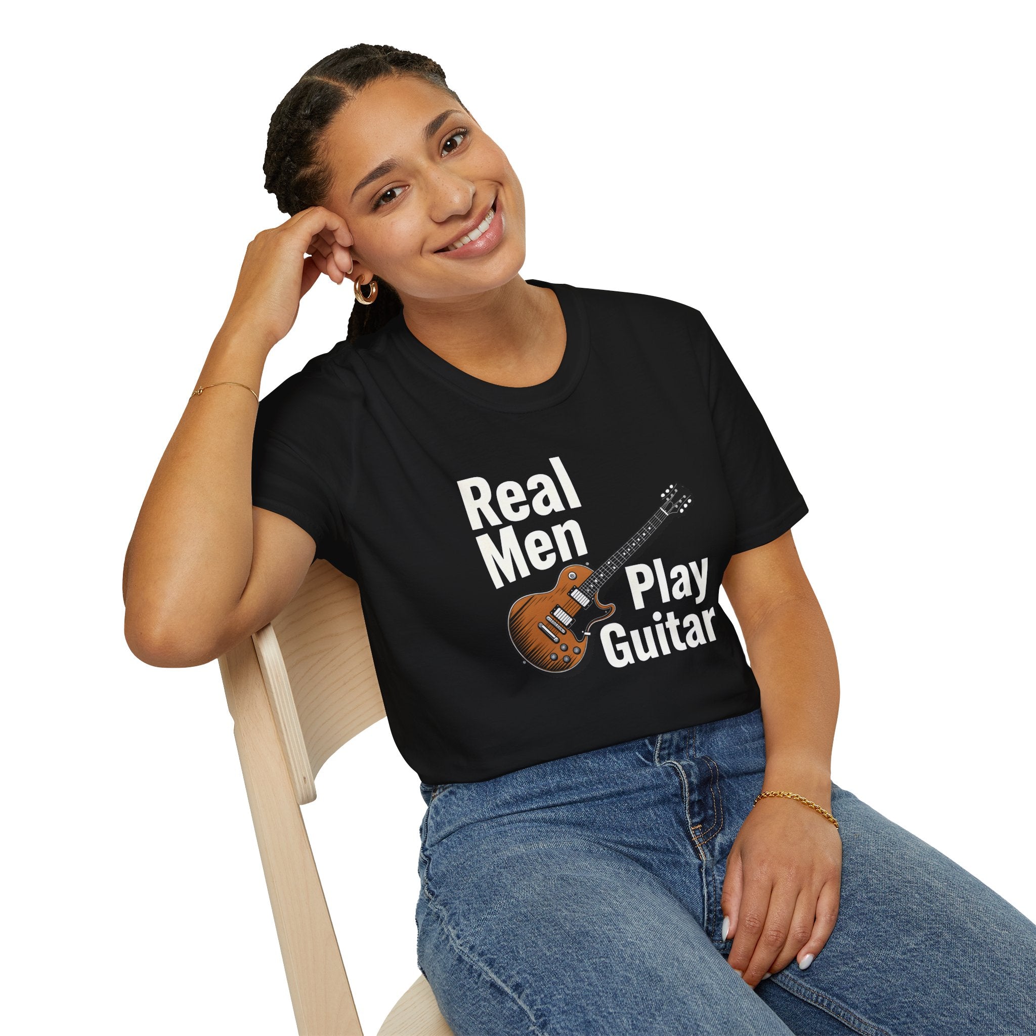 Person wearing a black t-shirt with 'Real Men Play Guitar' text and guitar graphic.