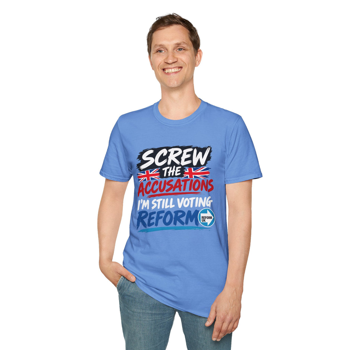 A man wearing a blue graphic t-shirt with the text 'SCREW THE ACCUSATIONS I'M STILL VOTING REFORM' and a Union Jack design, paired with blue jeans, against a plain white background.