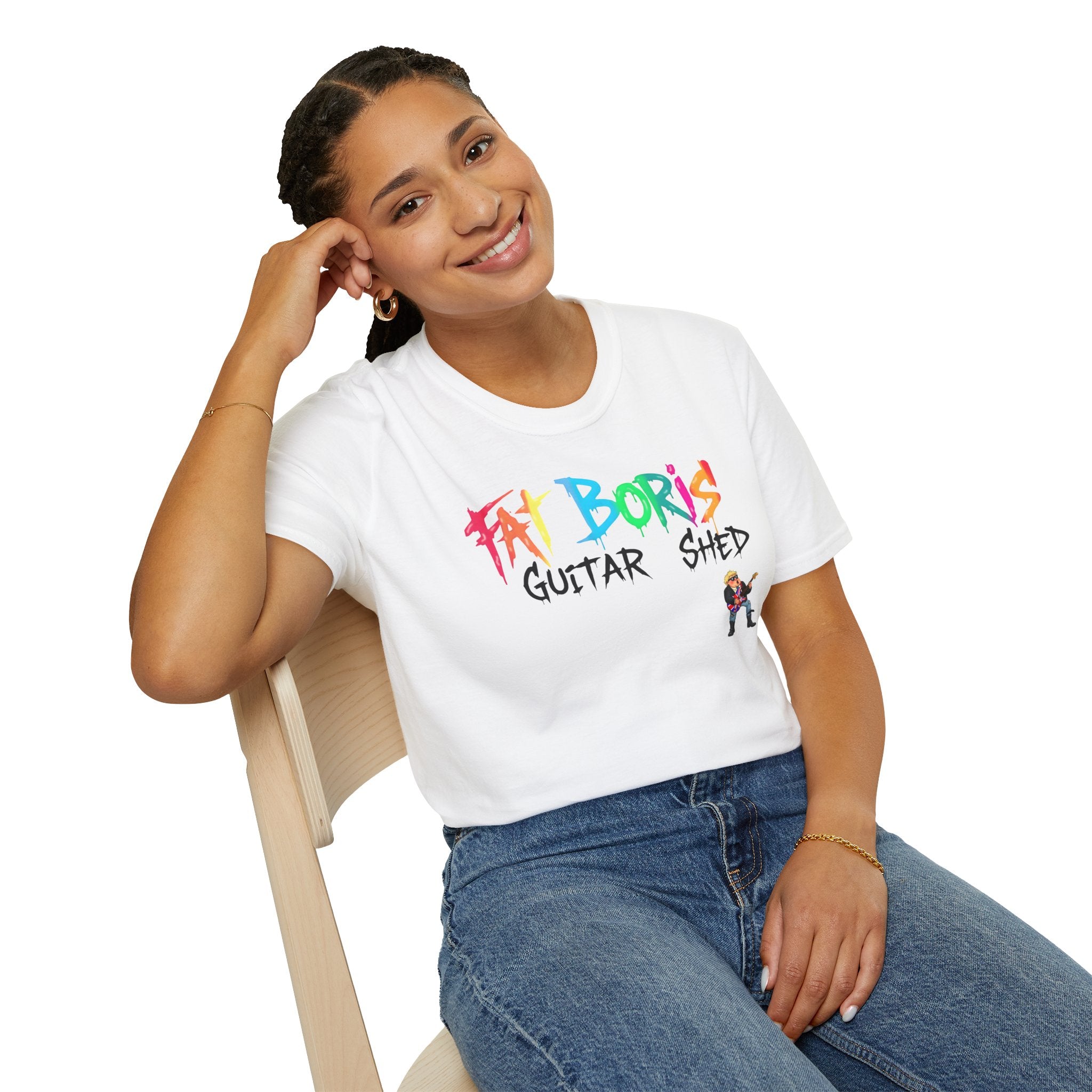 Person wearing a white t-shirt with colorful text and graphics, sitting on a chair against a white background.
