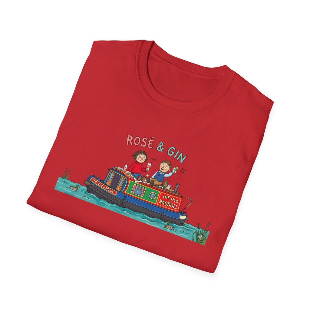 Folded red t-shirt with a graphic of two people on a boat and 'Rosé & Gin' text.