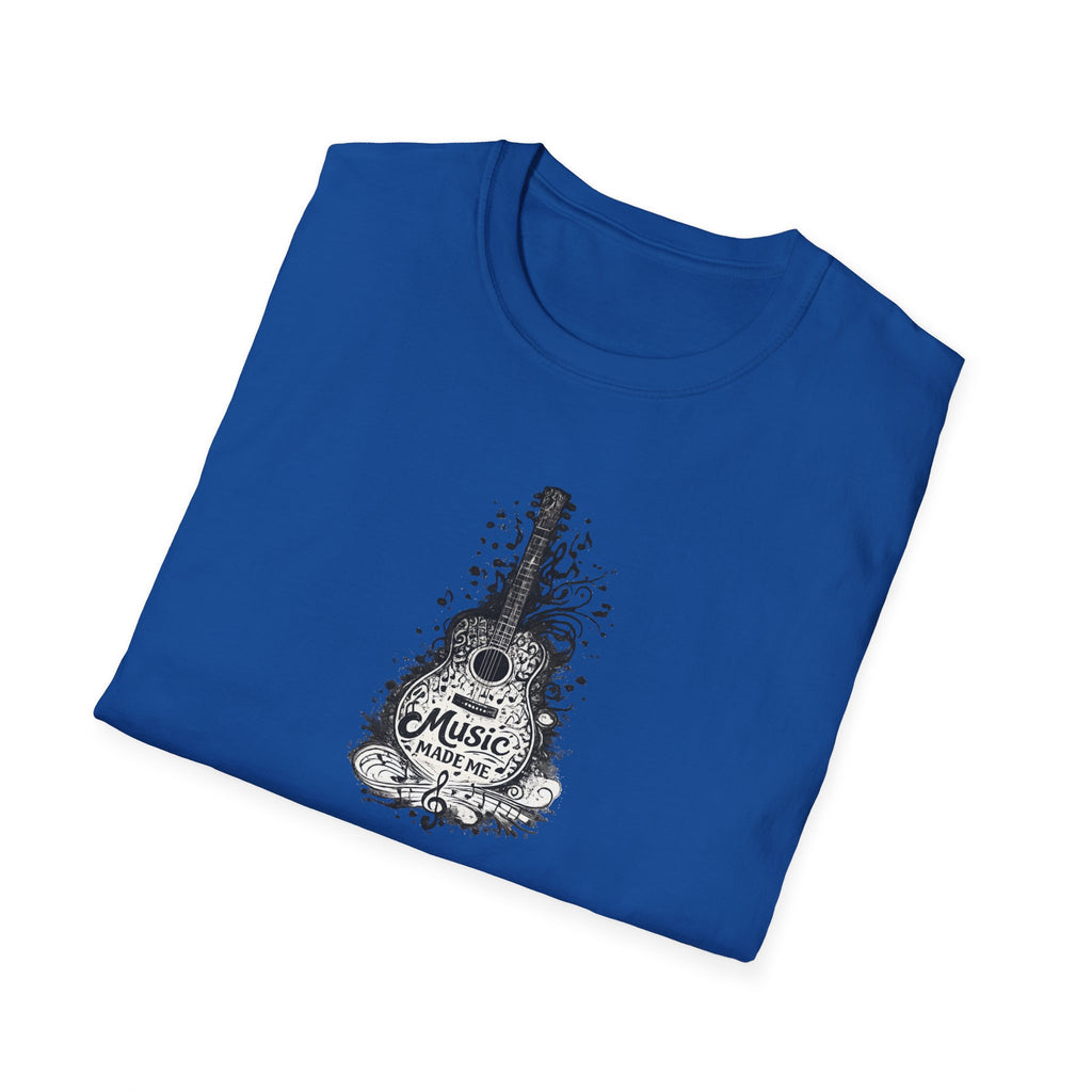 Folded blue t-shirt with a guitar graphic and 'Music Made Me' text on a white background