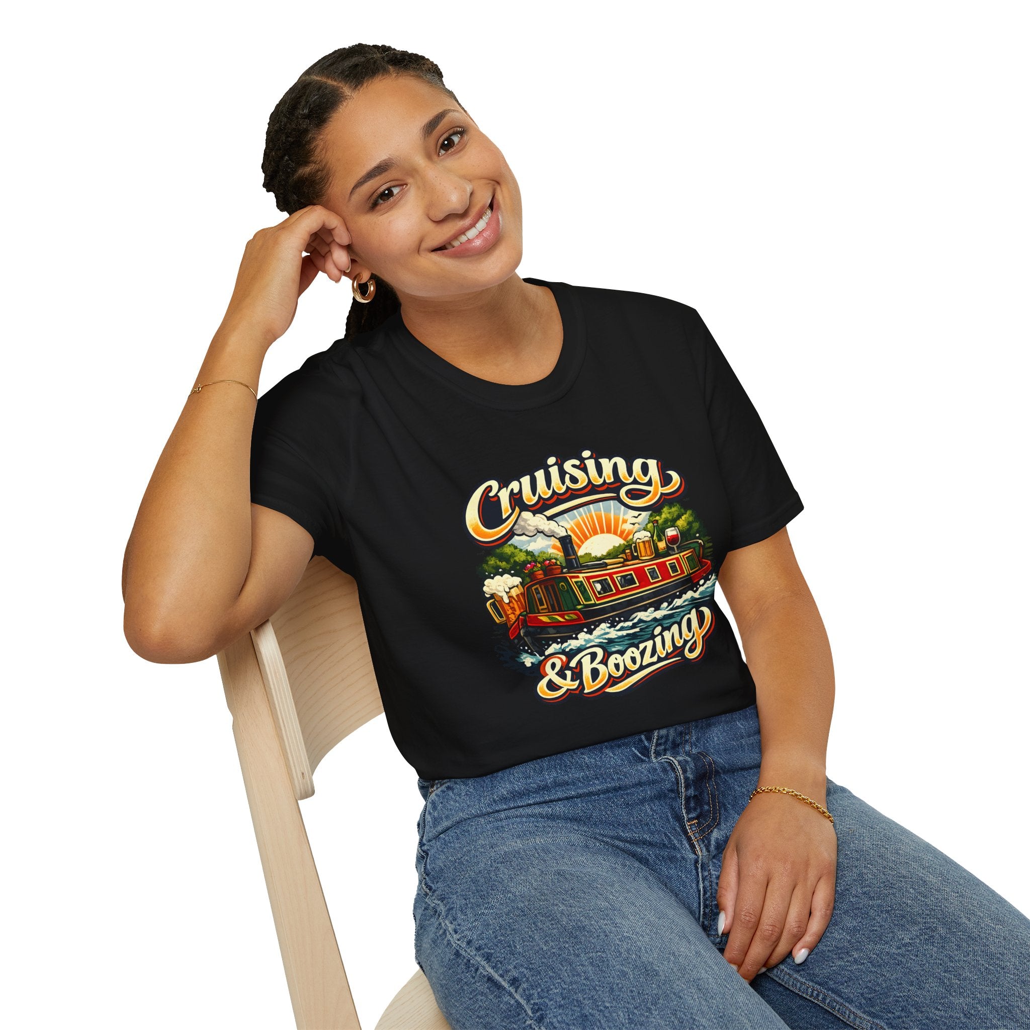 Person wearing a black t-shirt with 'Cruising & Boozing' graphic design.