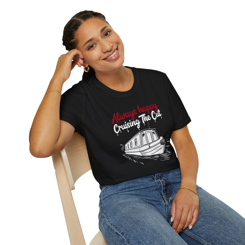Woman wearing a black t-shirt with a graphic and text, sitting on a chair.