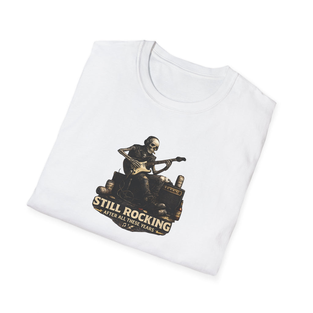 White t-shirt with a graphic design of a skeleton playing guitar and text 'Still Rocking After All These Years' on a white background.