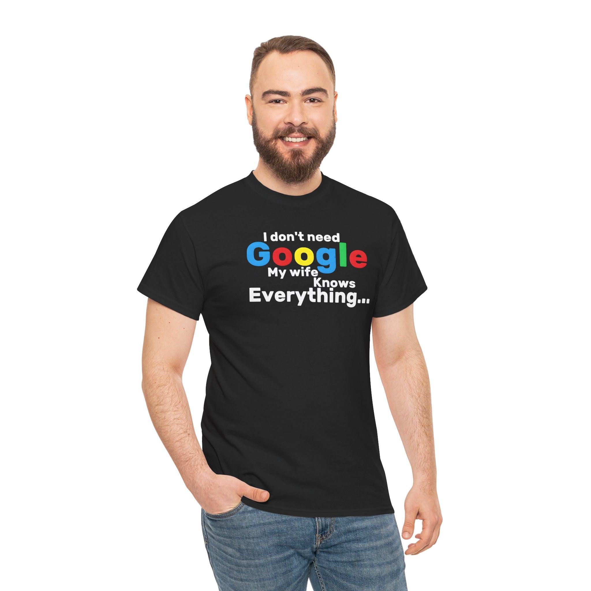 Man wearing a black t-shirt with humorous text Black t-shirt with colourful text, 'I don't need to google, my wife knows everything'.  On a white background   design on a white background