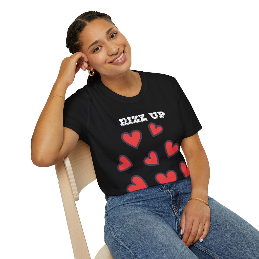 Woman wearing a black t-shirt with red hearts and 'Rizz Up' text, sitting on a chair.