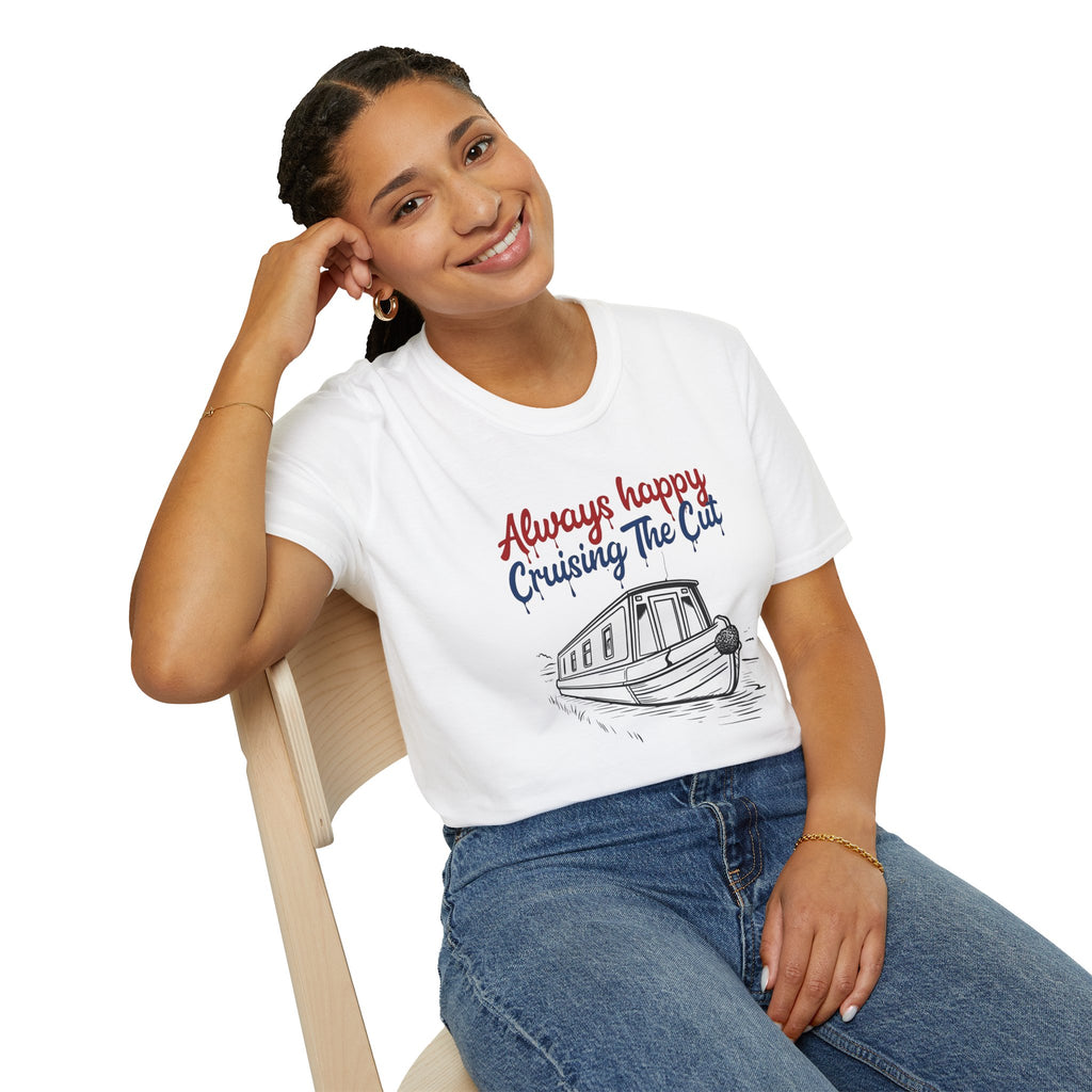 Person wearing a white t-shirt with a boat graphic and text, sitting on a chair.