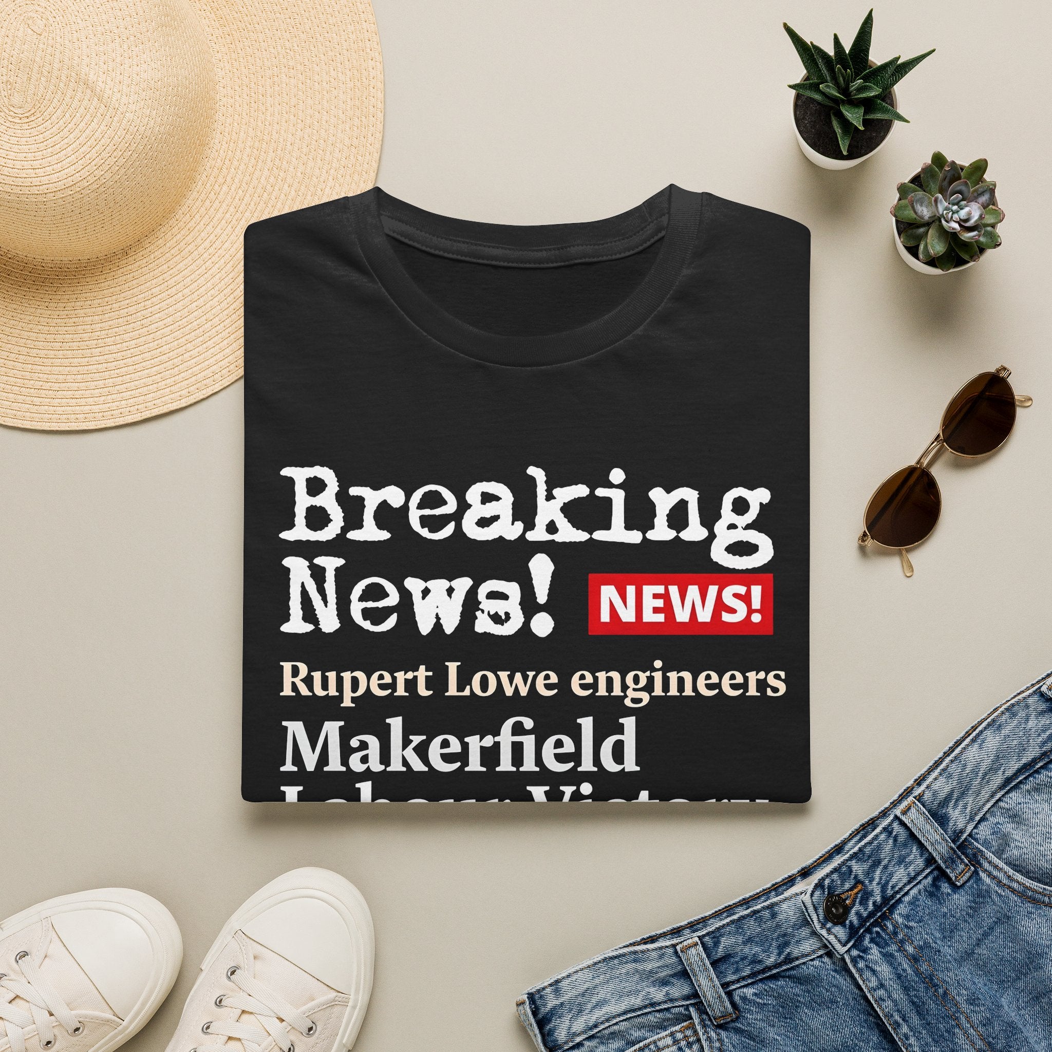 Breaking News BLACK T-Shirt — “Rupert Lowe engineers Makerfield Labour Victory” Graphic Tee Printify