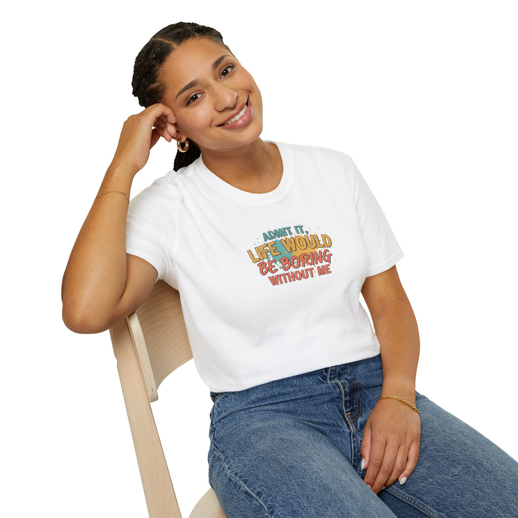 Person wearing a white t-shirt with colorful text design, sitting on a chair against a white background