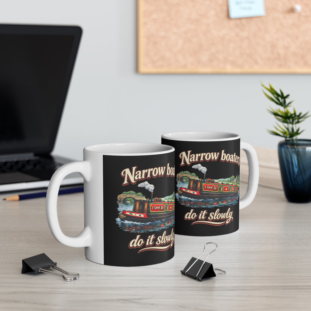 Black Mug — "Narrow Boaters Do It Slowly" Canal Boat Ceramic Coffee Mug Printify