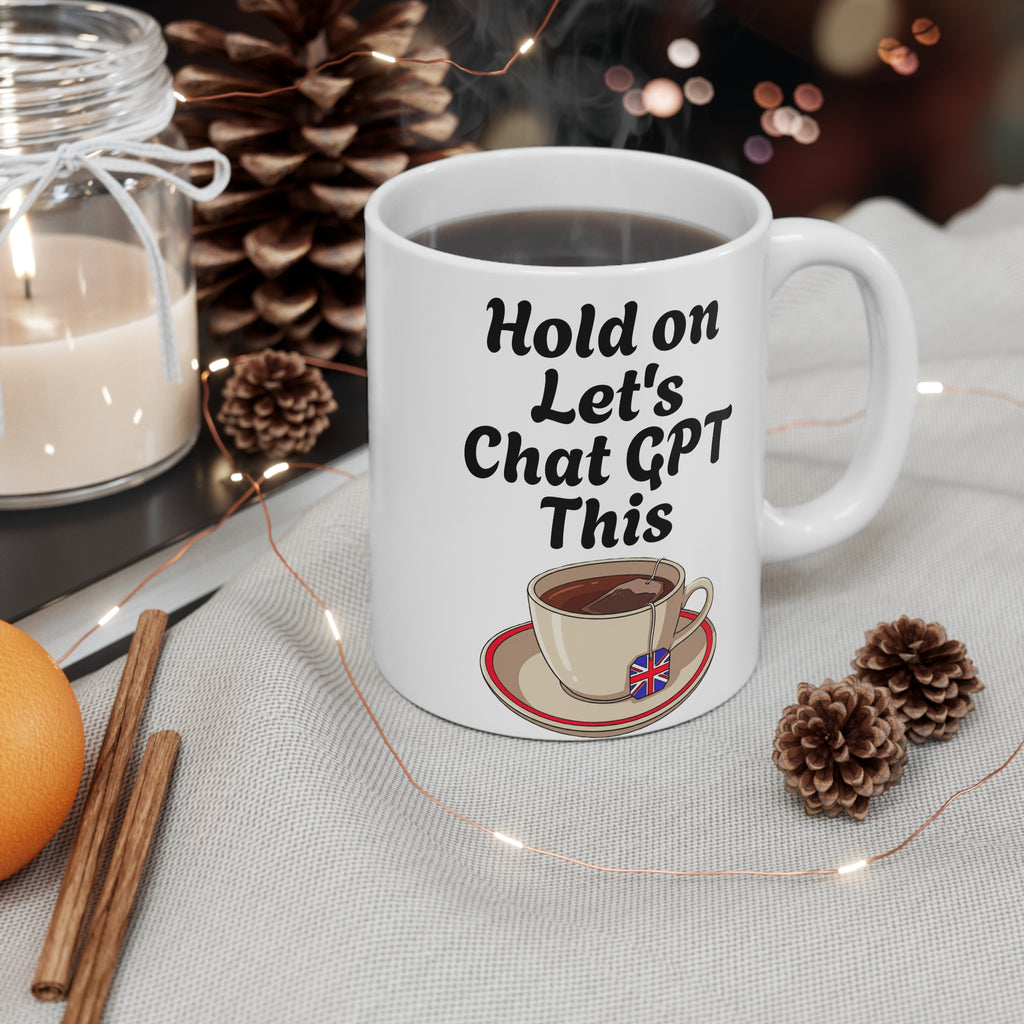 White mug with text 'Hold on Let's Chat GPT This' on a table with decorative items
