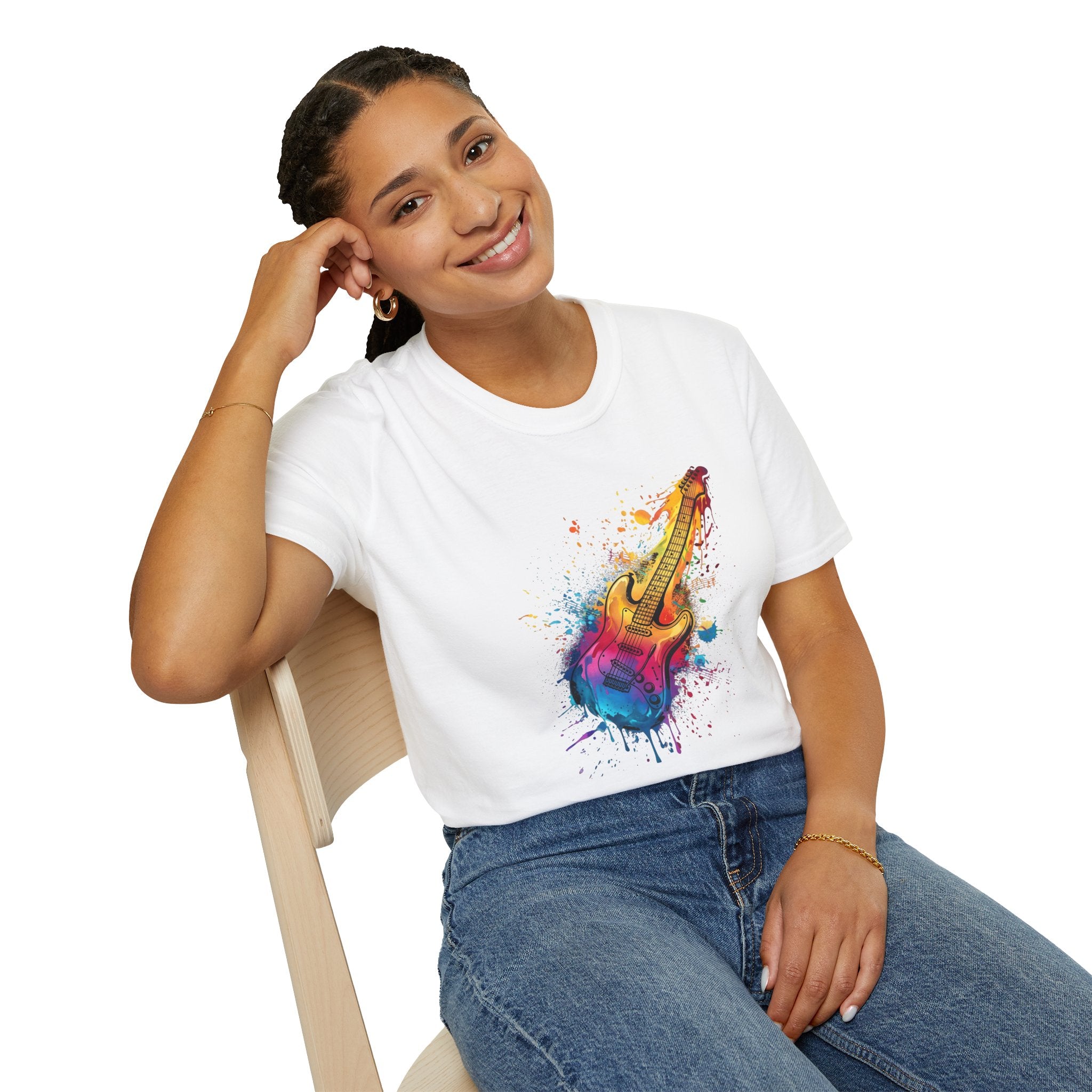 Person wearing a white t-shirt with a colorful guitar graphic on a white background