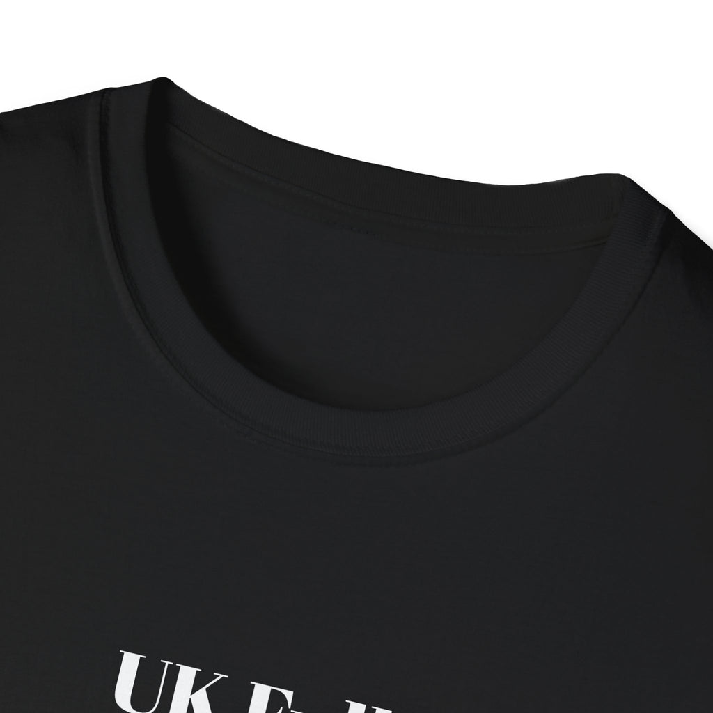 Close-up of a black t-shirt with text on a white background