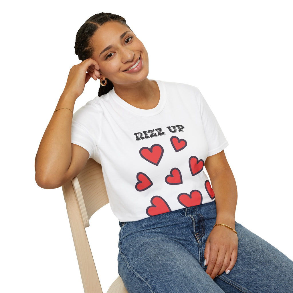 Woman wearing a white t-shirt with red heart patterns and 'Rizz Up' text, sitting on a chair.