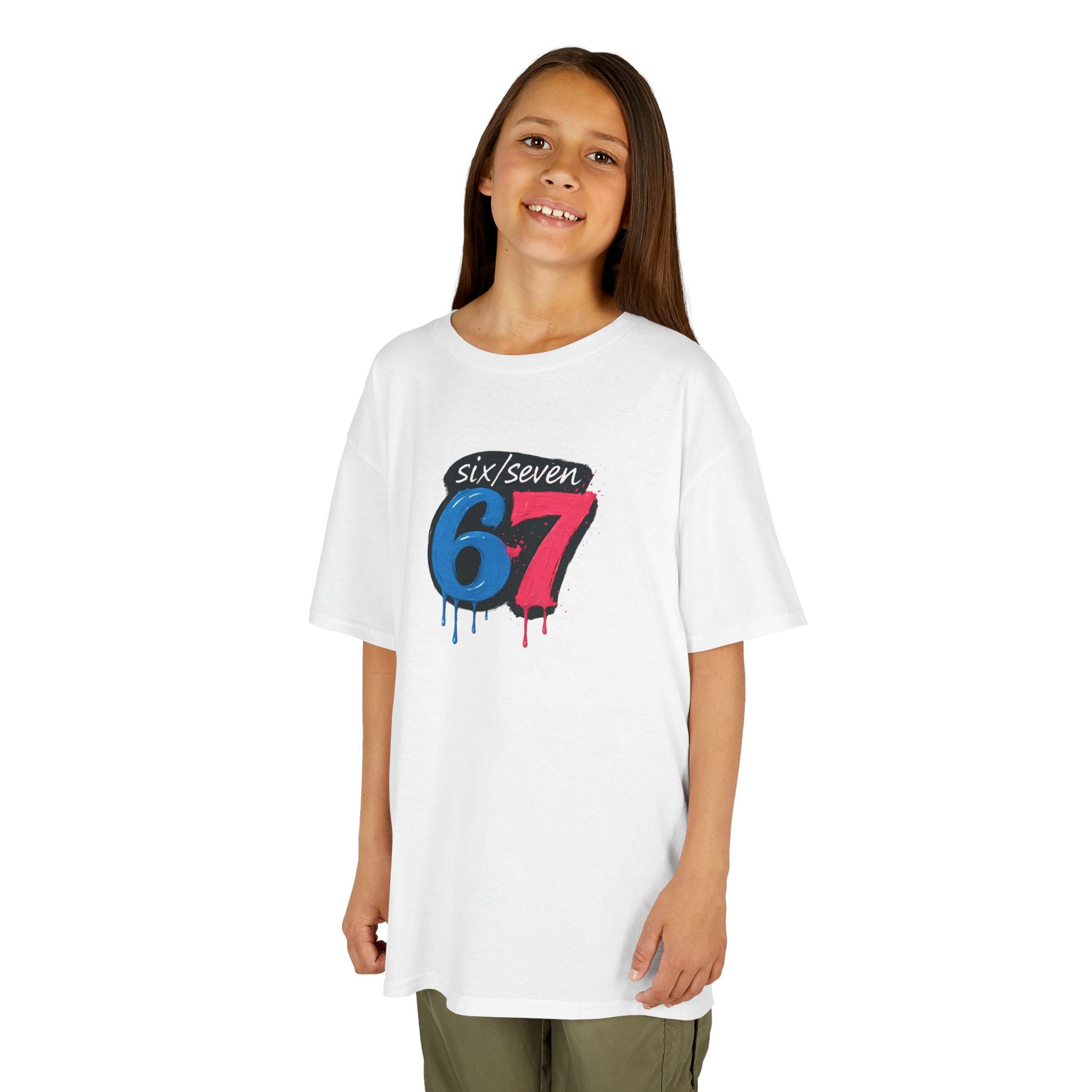 Young girl wearing a white t-shirt with colourful  six seven design on a white background