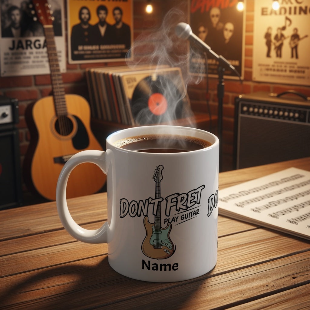 Coffee mugs in music room with don't fret play guitar graphic