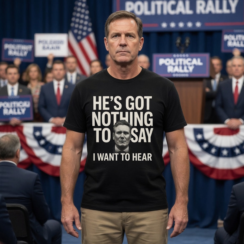 Man wearing a black t-shirt with a political message kier Starmer image he's got nothing to say I want to hear at a political rally
