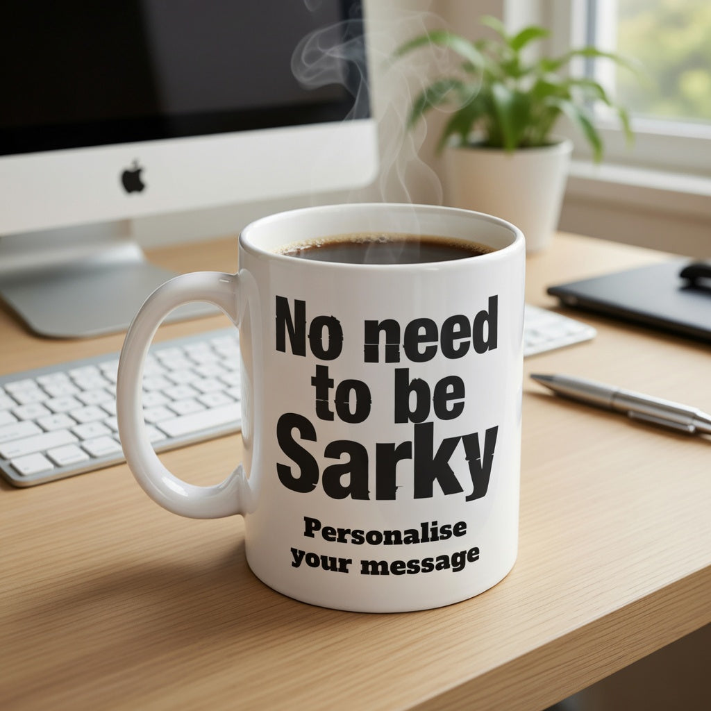 Customised White mug with no need to be sarky text on a desk with computer equipment